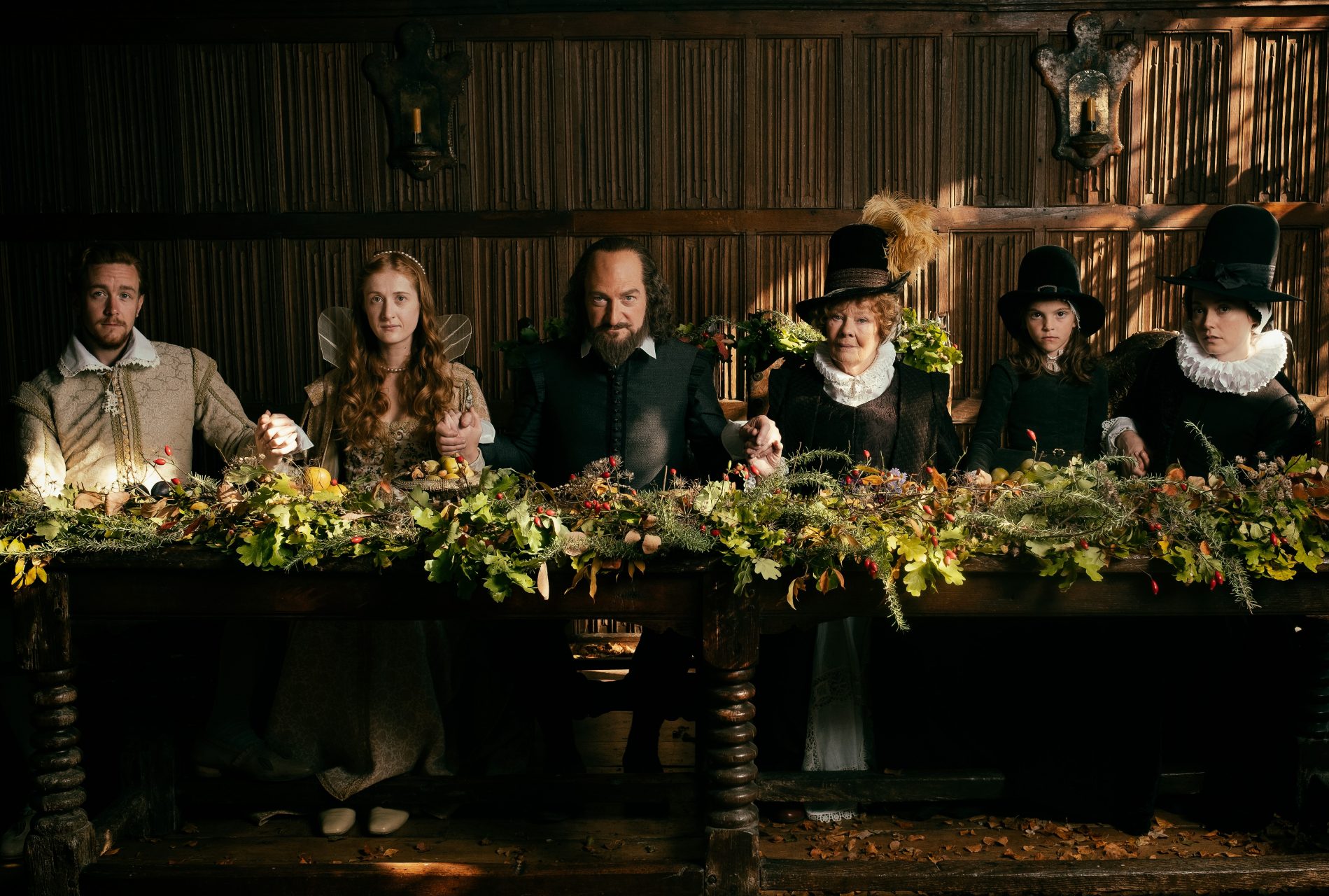 Left to right: Jack Colgrave Hirst as Tom Quiney, Kathryn Wilder as Judith Shakespeare, Kenneth Branagh as William Shakespeare, Judi Dench as Anne Hathaway, Clara Ducz-mal as Elizabeth Hall, Lydia Wilson as Susanna Hall Photo by Robert Youngson, Courtesy of Sony Pictures Classics