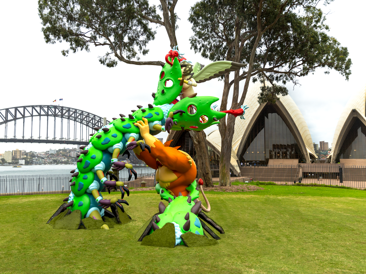 A sculpture of Rick and Morty character Birdperson at Bennelong Lawn in The Royal Botanic Garden in Sydney, Australia. The scene is part of the ongoing #WORMAGEDDON fan experience leading to the global release of Adult Swim’s Rick and Morty season six starting September 4, 2022. (Courtesy Adult Swim)